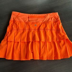 Lululemon orange Pace Rival pleated skort